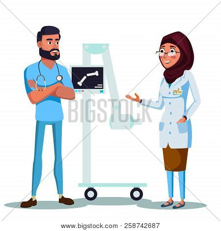 Cartoon Arab Doctors Discussing Diagnosis Looking At X-ray Scan Near Radiography Machine. Illustrati
