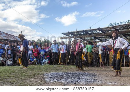 Bajawa, Indonesia - May 19: Unidentified Elders Dance In Front Of A Crowd Near Bajawa In East Nusa T