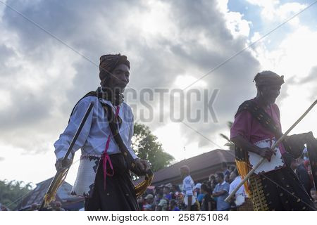 Bajawa, Indonesia - May 19: Unidentified Elders Against Tropical Clouds Near  Bajawa In East Nusa Te