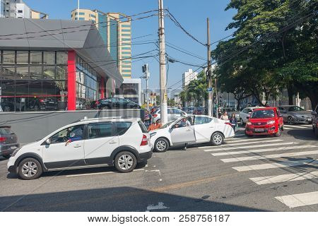 Cars Line In Front Of Gas Station