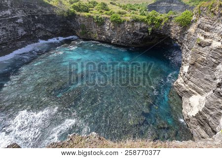 Looking Down At Blue And Aquamarine Water At Broken Beach On Nusa Penida.
