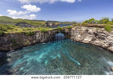 Tropical Waters In The Lagoon At Broken Beach, A Famous Tourist Destination On Nusa Penida.