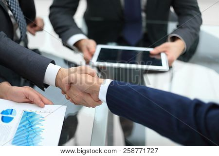 Business handshake. Business handshake and business people conce