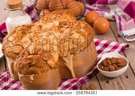 Easter Dove Bread (colomba Pasquale) On Wooden Table.