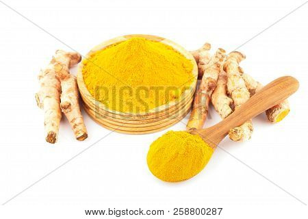Turmeric Powder In Wooden Spoon On White Background, Herbal
