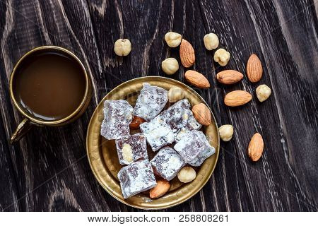 Oriental Arabian Sweets With Different Nuts A Cup Of Coffee. Eastern Sweets. Traditional Turkish Del