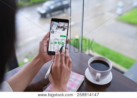 Chiang Mai, Thailand - August 18,2018: Woman Hands Holding Huawei With Uber Apps. Uber Is Smartphone