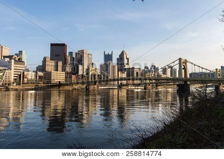 Downtown river waterfront and bridges crossing the Allegheny River in Pittsburgh, Pennsylvania.