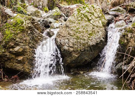 Autumn Waterfall With Rocks And Leaves In Troodos Mountains In Cyprus