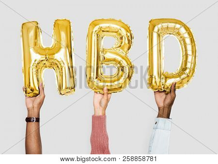 Yellow gold alphabet balloons forming the word HBD
