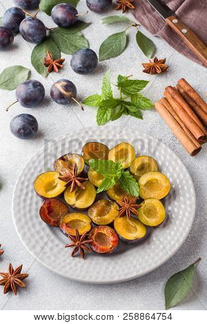 Fresh Berries Plums In The Context Of Cooking On The Plate