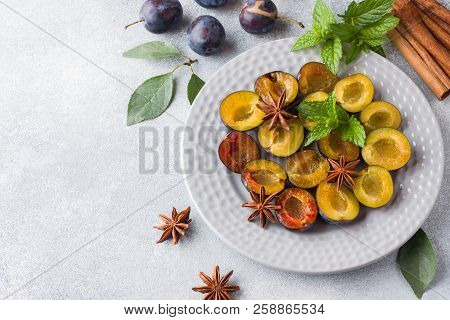 Fresh Berries Plums In The Context Of Cooking On The Plate