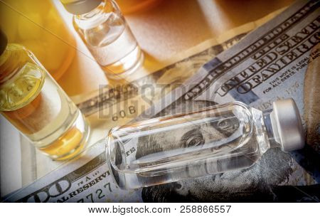 Vials With Different Substances Over Dollar, Concept Of Copayment