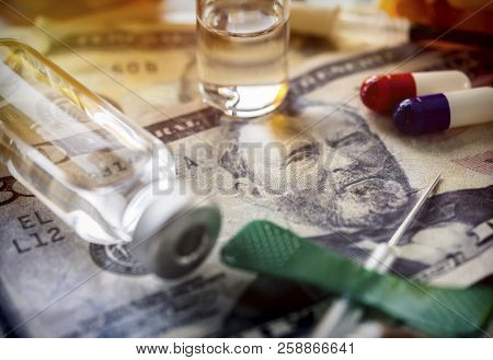 Vials With Different Substances Over Dollar, Concept Of Copayment