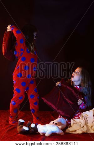 Kids In Pajamas Have Pilllow Fight, Copy Space