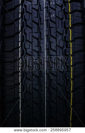 Clean New Car Tyre Vertical Rubber Tire Texture Pattern Background.