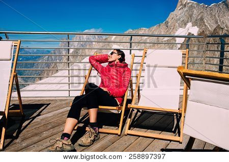 Tourist Resting On Chaise Lounges, At Punta Helbronner, Italy