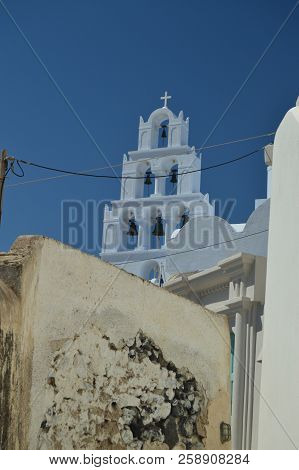 Bell Tower Of The Beautiful Church Of Pyrgos Kallistis On The Island Of Santorini. Travel, Cruises, 