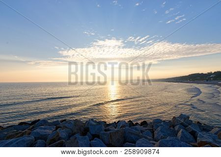Poland - Ustka, View From The Pier On Baltic Sea During Sunrise