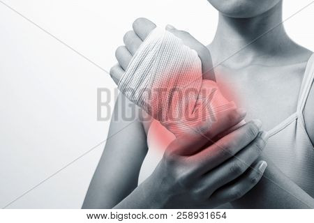 Tendon Pain At The Wrist Of A Woman From Exercise.