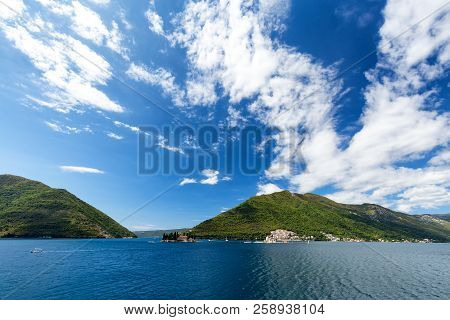Brilliant Blue Sky Over The Our Lady Of The Rock And The Sveti Dordje Churches On Neighboring Island
