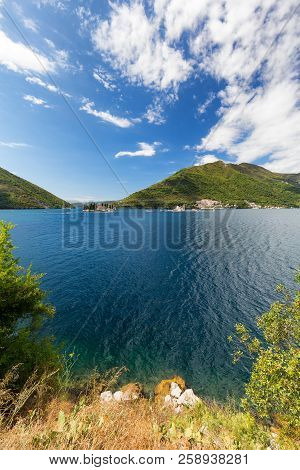 Portrait Roadside View Of The Our Lady Of The Rock And The Sveti Dordje Churches On Neighboring Isla