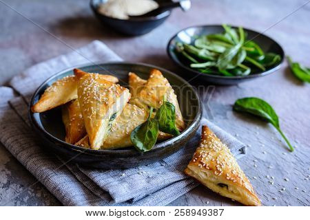 Spanakopita Triangles Stuffed With Spinach And Feta Cheese