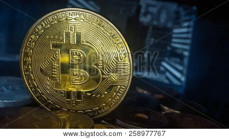 Bitcoin. Physical Bit Coin. Digital Currency. Cryptocurrency. Golden Coin With Bitcoin Symbol. Stock