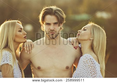 Girl And Women With Boyfriend Outdoor. Man With Muscular Body With Twins. Blonde And Guy With Athlet