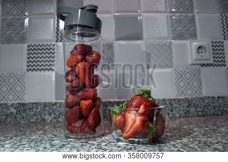 Fresh Sweet Strawberry Inside Of Glass Bottle