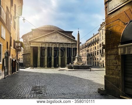 The Pantheon And The Fountain In Piazza Della Rotonda In Rome Seen From Via Del Pantheon. Italy Famo