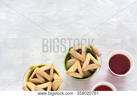 Traditional Sweets For Jewish Holiday Of Purim. Hamantashen Cookies Or Aman Ears, Triangular Cookies