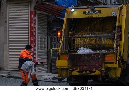 Istanbul, Turkey - 25 March, 2020: Street Cleaner Wearing Face Mask To Protect From Corona Virus (co