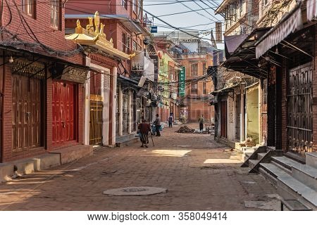 March 25, 2020. Kathmandu, Nepal. The Area Of ​​stupa Bouda. A Deserted Street With Quarantine Close