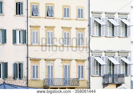 Surface Building Apartment  With Different Style Of Windows In Certer City. Vintage Background Conep