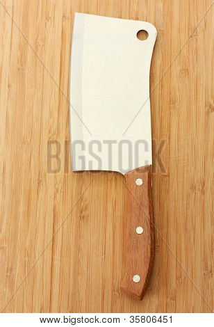 mannaia di carne sul primo piano sfondo legno