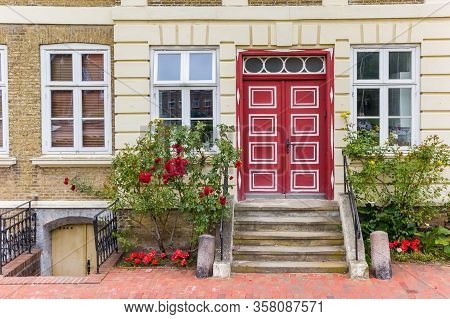 Red Door At A Historic House In Gluckstadt, Germany
