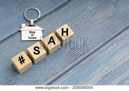 Concept Image A Wooden Block And Word - #sah ( Stay At Home ) On Wooden Background. Coronavirus And 