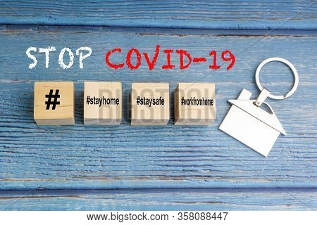 Concept Image A Wooden Block And Word - #wfh ( Work From Home, Stay Home And Stay Safe On Wooden Bac