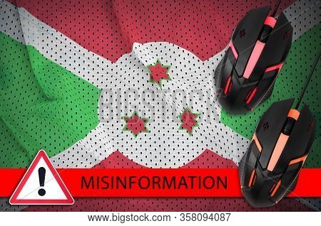 Burundi Flag And Two Computer Mouses. Misinformation During Coronavirus Or 2019-ncov Virus Concept