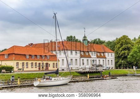 Gluckstadt, Germany - June 27, 2019: Sailing Ship In Front Of The Rantzau Palace In Gluckstadt, Germ
