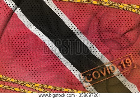 Trinidad And Tobago Flag And Covid-19 Biohazard Symbol With Quarantine Orange Tape And Stamp. Corona