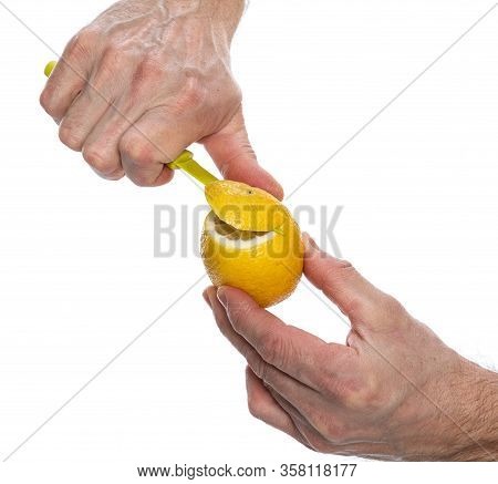 Raising Immunity And Healthcare Concept. Man Cutiing A Lemon Over White  Background