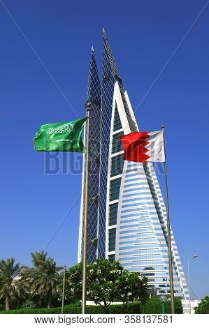 The Iconic Bahrain World Trade Center Or Bwtc Building With Saudi Arabia Flag And Bahrain Flag, Mana