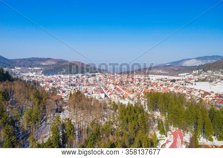 Croatia, Drone Aerial View Of The Town Of Delnice In Gorski Kotar In Winter, Mountain Landscape In B