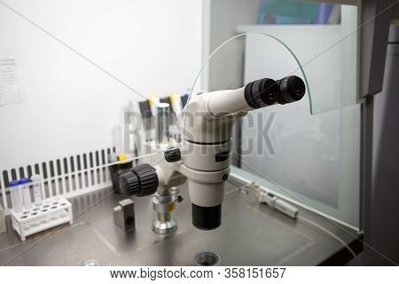 The Equipment In The Laboratory Of The Clinic Of In Vitro Fertilization Ivf. Microscope, Tubes, Nitr