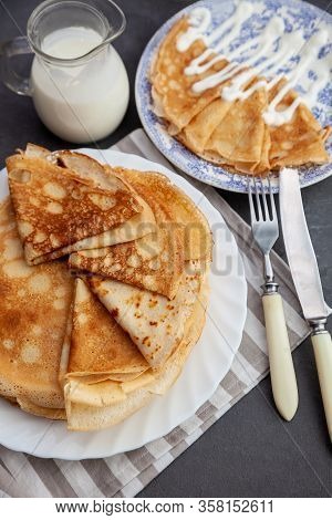 A Stack Of Thin Pancakes On A Plate. Homemade Pastries. Pancakes For Breakfast. Appetizing Food. Thi