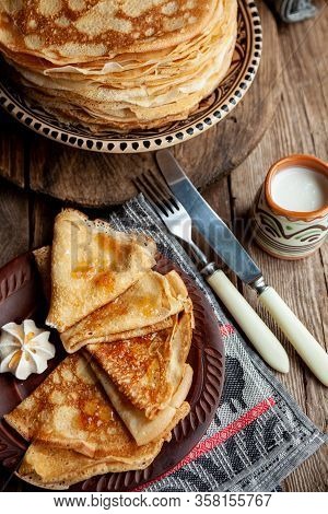 A Stack Of Thin Pancakes On A Plate. Homemade Pastries. Pancakes For Breakfast. Appetizing Food. Thi