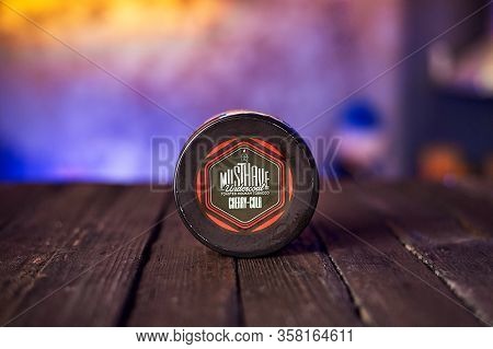 Moscow, Russia - March 6, 2020, Must Have Toasted Hookah Tobacco For On A Wooden Table.