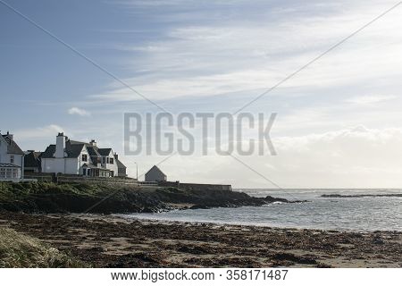 A View Of The Bay At The Welsh Resort Of Rhosneigr On The Beautiful Island Of Anglesey. A Brisk Wint